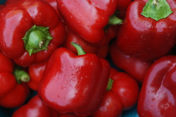 red peppers on a black background