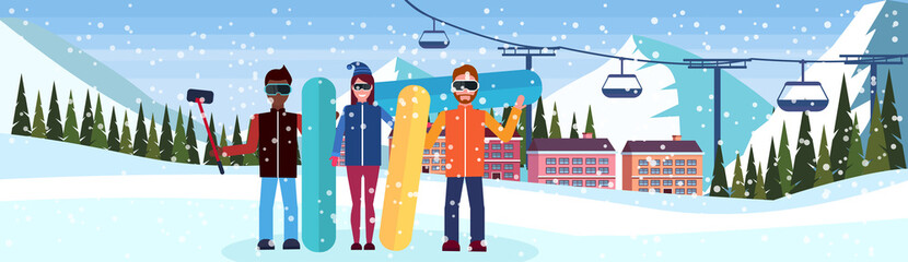 mix race snowboarders taking selfie ski resort hotel houses buildings cable car snowy mountains fir tree landscape background winter vacation concept flat horizontal
