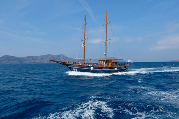 Boat trip on the caldera around the island of Santorini, Greece
