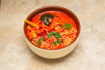 Spicy Thai Tom Yum soup with shrimps and coconut milk