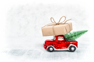 Red car gift box Christmas tree white background
