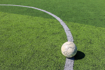 Football on artificial turf. It is for green background in a stadium