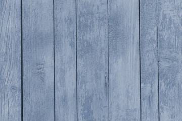 gray steel old wooden fence. wood palisade background. planks texture, weathered surface