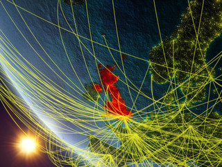 United Kingdom on planet Earth from space with network. Concept of international communication, technology and travel.