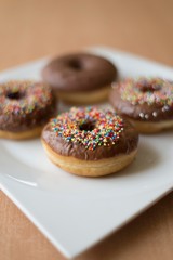 donuts isolated on white plate