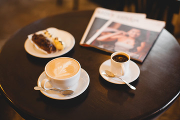 A mug of fragrant cappuccino brought by the waiter