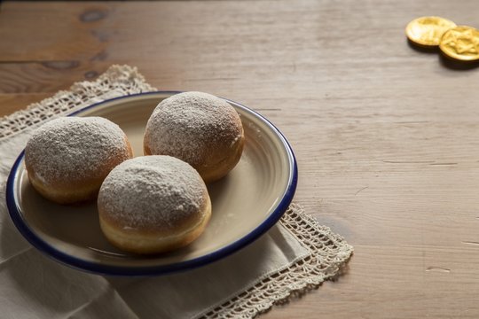 Vintage style Hanukkah celebration concept image-closeup of donu