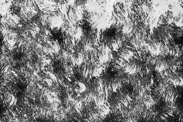 Black with grey ink texture with abstract washes and brush strokes on white watercolor paper background.