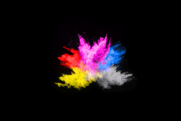 Fototapeta na wymiar abstract colored dust explosion on a black background.abstract powder splatted background,Freeze motion of color powder exploding/throwing color powder, multicolored glitter texture.