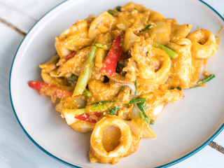 Fried Squid with Curry, Ready to serve on the table.Thai food