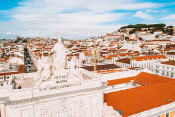Commerce square, Rua Augusta Arch close-up of the statues by Celestin Anatole Calmels: Glory...