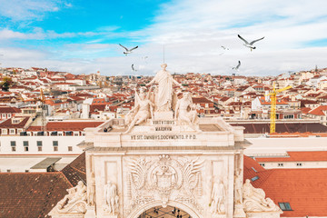Commerce square, Rua Augusta Arch close-up of the statues by Celestin Anatole Calmels: Glory...