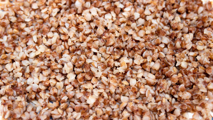 Buckwheat. Background and texture of buckwheat. Boiled buckwheat.