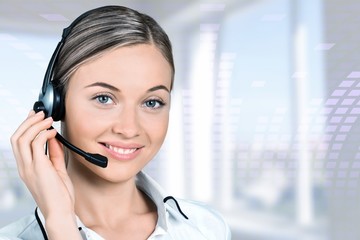 Customer support operator with a headset on white background