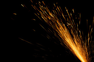 fountain of fire spray on a black background