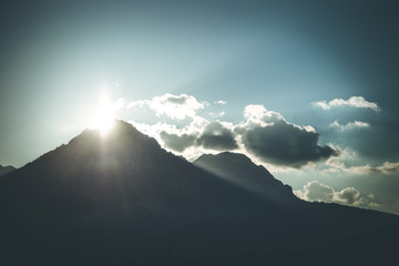 Sunset on a mountain, light beams