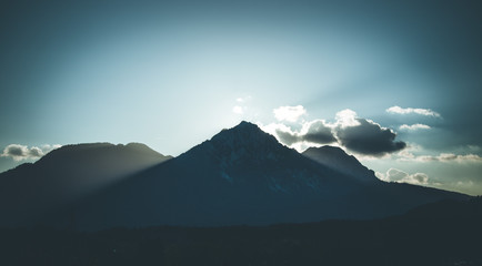 Fototapeta na wymiar Sunset on a mountain, light beams