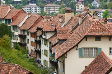 Fototapeta na wymiar Old tile roofs in Bern historical center.