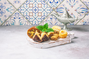 Traditional arabic dessert Baklava with honey and nuts, selective focus
