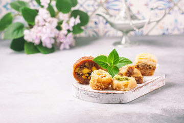 Traditional arabic dessert Baklava with honey and nuts, selective focus