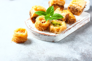 Traditional arabic dessert Baklava with honey and nuts, selective focus