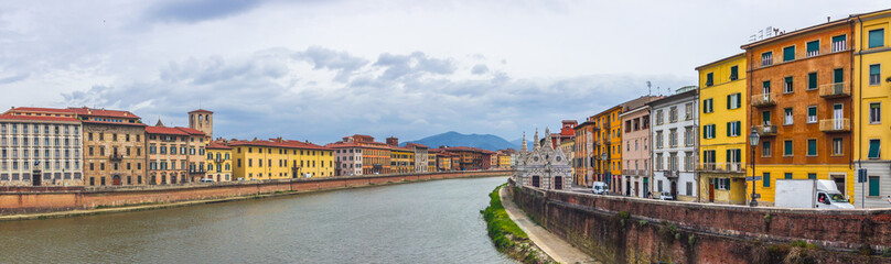 Fototapeta na wymiar buildings and Arno River in Pisa in Tuscany