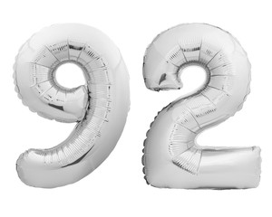 Silver chrome number number 92 ninety two made of inflatable balloon on white