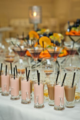 Glass glasses with colored drinks on the table. alcoholic drinks at the buffet