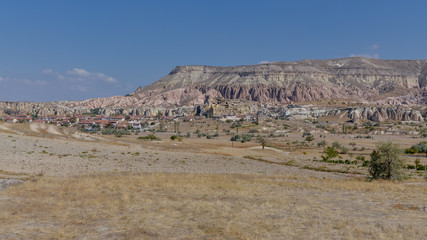 scenic view of Cavusin village and surrounding cliffs  Goreme National Park, Nevsehir province, Turkey