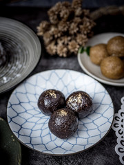 Fototapeta na wymiar Healthy organic date energy balls with dried fruits and nuts. Food for healthy lifestyle.