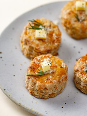 Homemade Cheese Scones with butter.