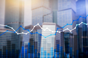 Double exposure financial graphs and diagrams.