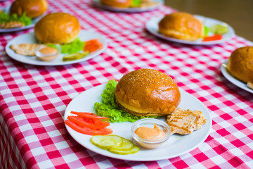 ingredients for making sandwiches with rolls on the table