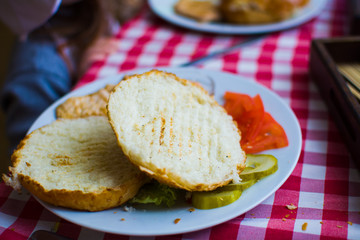 ingredients for making sandwiches with rolls on the table