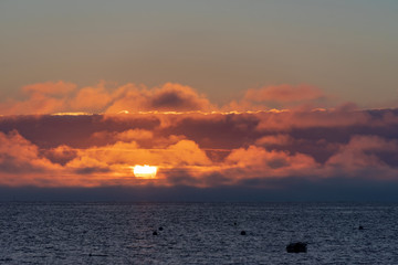 sun ennuagé