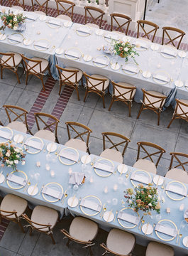 Place settings at an outdoor wedding reception