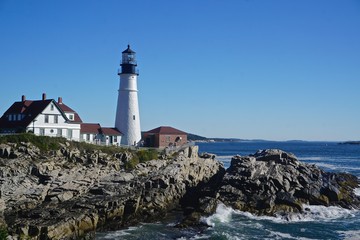 Fototapeta na wymiar Cape Elizabeth, Maine, USA: The Portland Head Light (1791), on a head of land at the entrance to the primary shipping channel of Portland Harbor, is the oldest lighthouse in Maine.