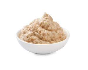 Horseradish in bowl isolated. Organic sauce.