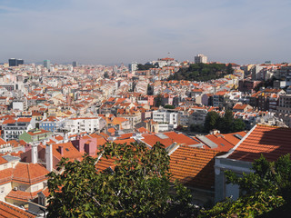 Fototapeta na wymiar Lisbon orange roofs from popular touristic view place