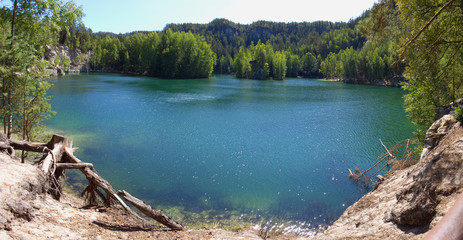 Adršpach-Teplice Rocks in Czech Republic. Piskovna Lake. Blue lake in the mountains. High resolution picture.