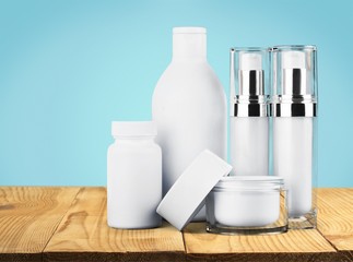 Set of cosmetic products in  containers isolated