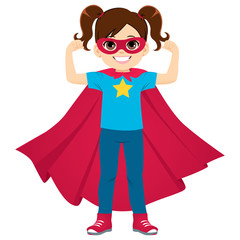 Cute super hero little girl standing flexing arms showing strength