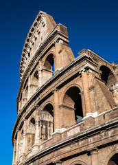 Fototapeta premium The Ancient Colosseum in Modern Rome