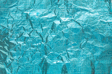 Blue crumpled foil background