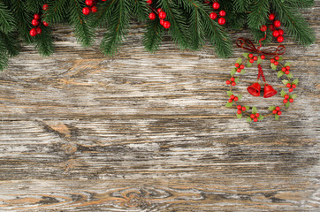 Christmas and New Year wooden background with fir tree in rustic style.
