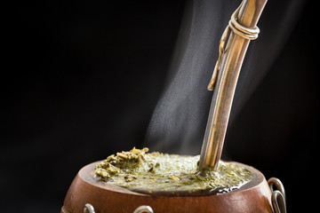 Steaming mate infusion in its customary gourd cup