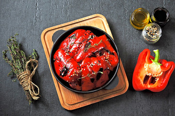 Red paprika grill in a cast iron skillet. Healthy snack. Vegan lunch