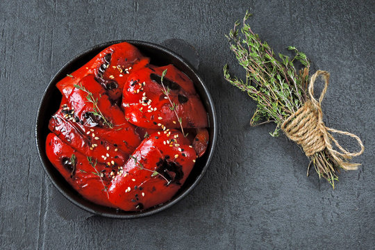 Red paprika grill in a cast iron skillet. Healthy snack. Vegan lunch