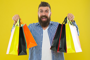 brutal caucasian hipster with moustache. Mature hipster with beard. Fashion man with beard. Bearded man. Male barber care. happy shopping. happy man with shopping bags. big sale. black friday