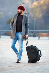 Bearded man. Fashion man with beard. Male barber care. Mature hipster with beard. brutal caucasian hipster with moustache. traveling concept. Looking trendy. travel with baggage